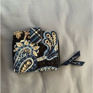 Vera Bradley blue and paisley design wallet.